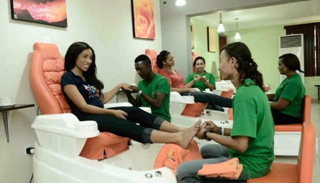 lady-undergoing-nail-treatment-at-apples-and-oranges-total-body-therapy-lagos-hotels.ng