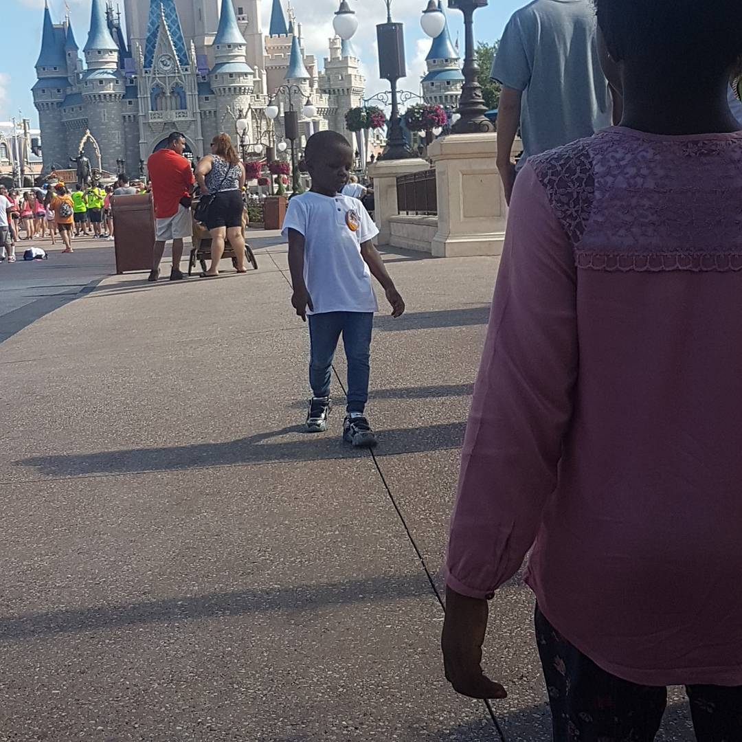 boy having fun at disney land florida tour