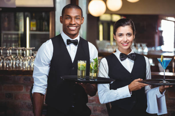 Most popular jobs Nigerians do abroad: waiters with cocktail trays